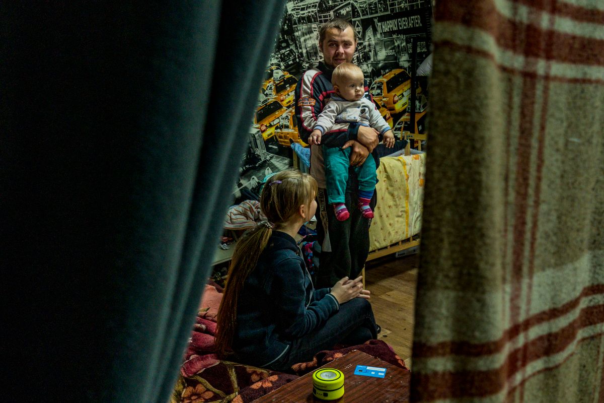 A displaced family from the russian occupied city of Mala Tokmachka in their room shelter in Zaporizhia, Ukraine. Many people moved out of the russian occupied villages to the main cities in Ukraine because the constant shelling during the combats or because they lost their homes.