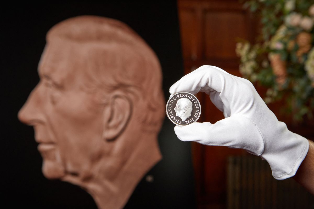 An undated handout picture released by the Royal Mint, received in London on September 29, 2022 shows the new King's portrait created by British sculptor Martin Jennings on a special Ł5 Crown, unveiled as the first official coin effigy of King Charles III. - The Royal Mint has depicted Britain’s Royal Family on coins for over 1,100 years, documenting each monarch since Alfred the Great.