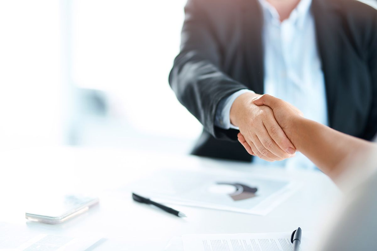 Bring the best, become even better Cropped shot of two businesswomen shaking hands during a meeting in a modern office