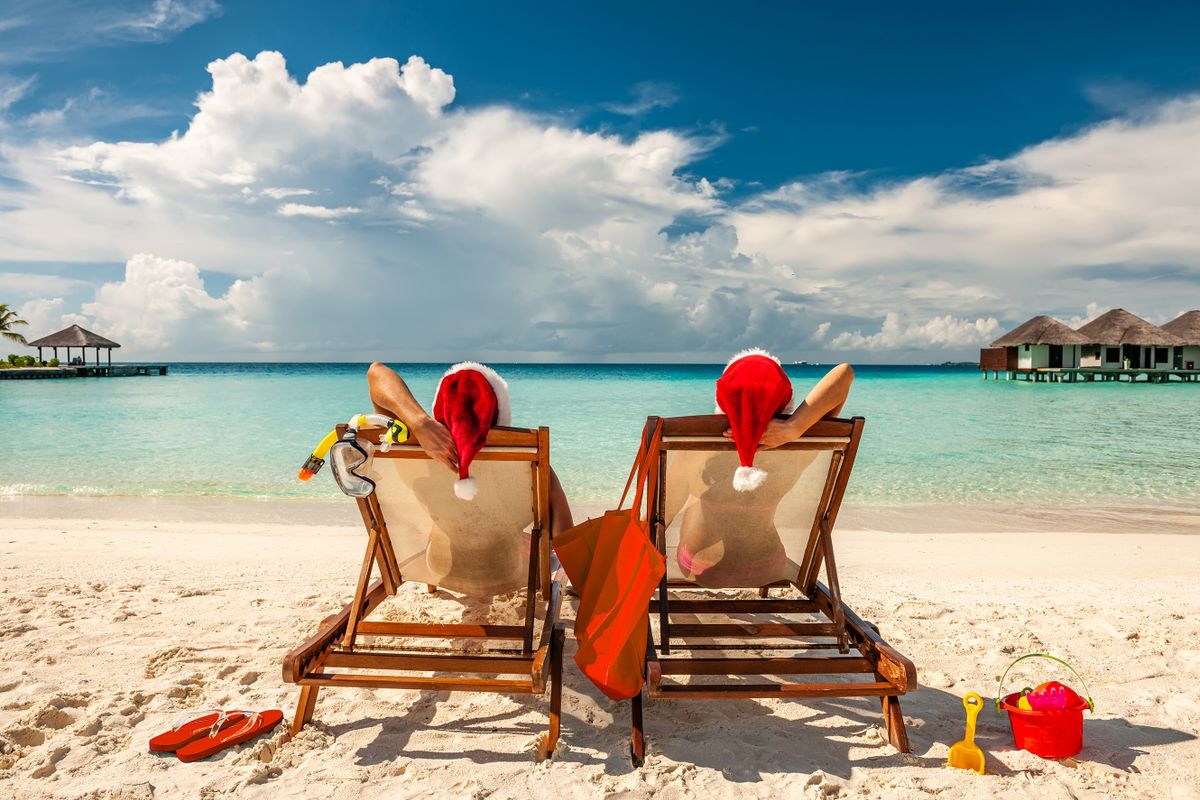 Couple,On,A,Tropical,Beach,In,Maldives,At,Christmas