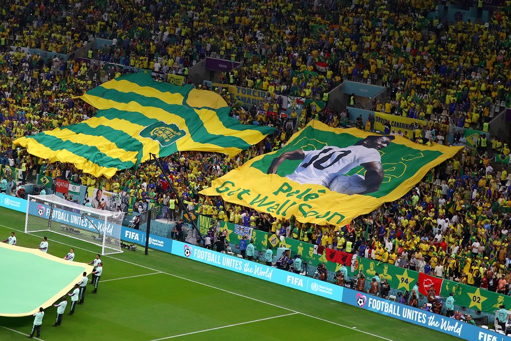 Cameroon v Brazil: Group G - FIFA World Cup Qatar 2022LUSAIL CITY, QATAR - DECEMBER 02: A flag of Brazil legend Pele is unveiled in the crowd ahead  the FIFA World Cup Qatar 2022 Group G match between Cameroon and Brazil at Lusail Stadium on December 02, 2022 in Lusail City, Qatar. (Photo by Stefan Matzke - sampics/Corbis via Getty Images)