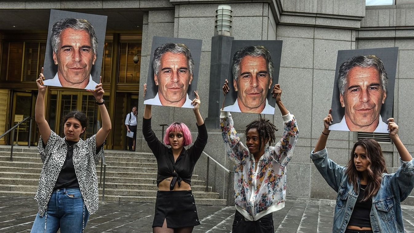 Jeffrey Epstein Appears In Manhattan Federal Court On Sex Trafficking Charges NEW YORK, NY - JULY 08: A protest group called "Hot Mess" hold up signs of Jeffrey Epstein in front of the Federal courthouse on July 8, 2019 in New York City. According to reports, Epstein will be charged with one count of sex trafficking of minors and one count of conspiracy to engage in sex trafficking of minors. (Photo by Stephanie Keith/Getty Images)