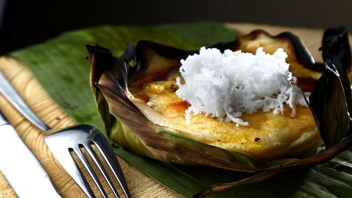 Photo,Of,Freshly,Cooked,Filipino,Delicacy,Called,Bibingka,Or,Ground Photo of freshly cooked Filipino delicacy called bibingka or ground glutenous rice cooked in coal pots