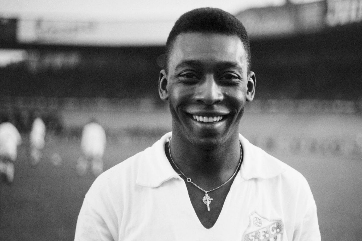 (FILES) In this file photo taken on June 13, 1961 Brazilian striker Pelé, wearing his Santos jersey, smiles before playing a friendly soccer match with his club against the French club of "Racing", in Colombes, in the suburbs of Paris. - Brazilian football icon Pele, widely regarded as the greatest player of all time and a three-time World Cup winner who masterminded the 'beautiful game', died on December 29, 2022 at the age of 82, after battling kidney problems and colon cancer. 