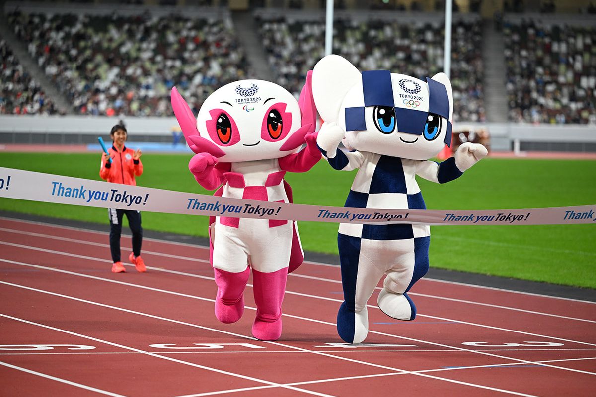 "Thank you Tokyo!" Tokyo 2020 Games One Year Anniversary Event TOKYO, JAPAN - OCTOBER 16: Miraitowa and Someity Mascot of  the Tokyo 2020 Olympic break the finishing tape during the "Thank you Tokyo!" Tokyo 2020 Games One Year Anniversary Event on October 16, 2022 in Tokyo, Japan. (Photo by Kenta Harada/Getty Images)