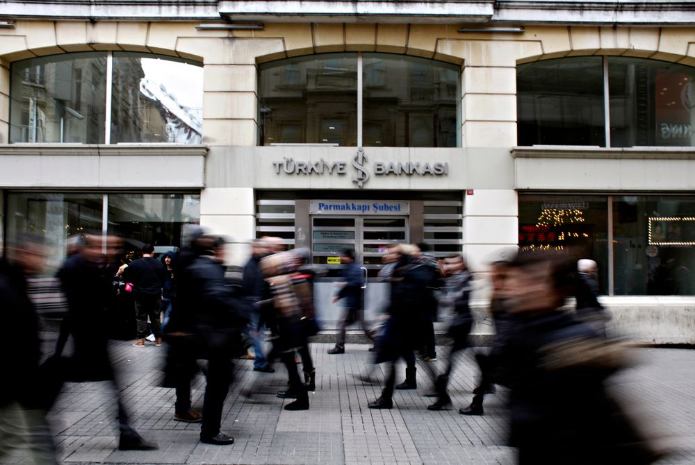 Peole,Walk,Past,A,Branch,Of,National,Bank,Of,Turkey