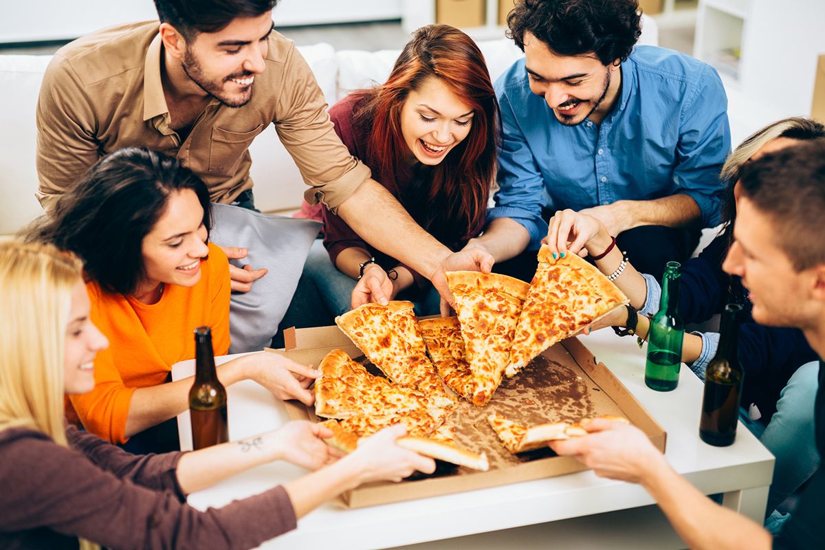 Pizza time, Group of friends eating pizza together.