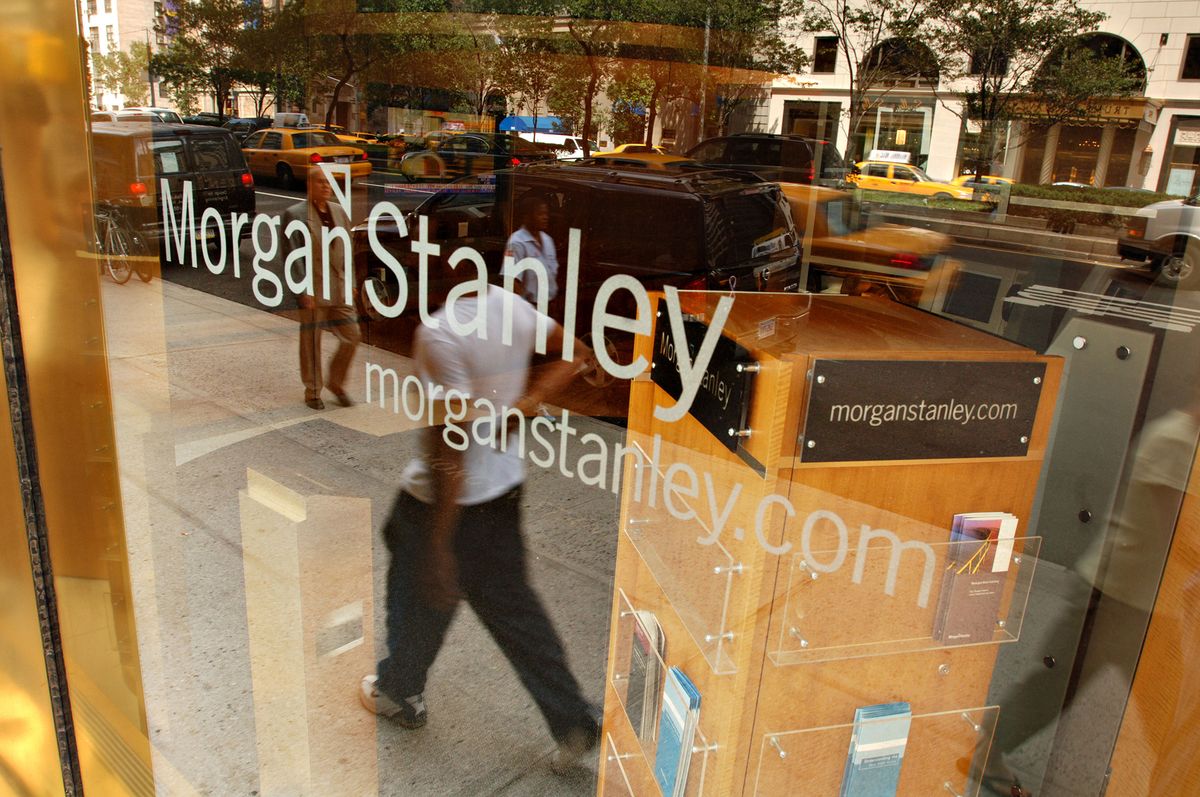 A Morgan Stanley logo hangs in the window of a retail broker