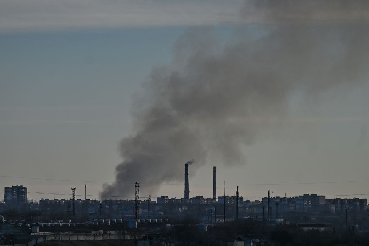 View of smoke over Karabell Island in Kherson after an earlier missile attack, seen from a distance, from Chornobaivka village. More than a month after the liberation, Ukrainian Kherson and the surrounding villages are bombarded daily by Russian troops from the left bank of the Dnieper. Rockets and missiles are fired all day, killing and injuring innocent people.On Wednesday, December 14, 2022, in Kherson, Kherson Oblast, Ukraine.