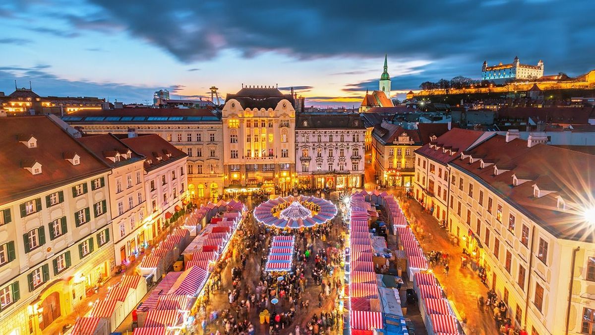 Main,Square,And,Christmas,Market,In,Historical,Center,Of,Bratislava Main square and Christmas market in historical center of Bratislava city at sunset, Slovakia.