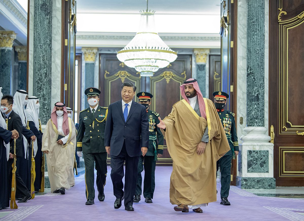 Chinese President Xi Jinping in Saudi Arabia RIYADH, SAUDI ARABIA - DECEMBER 8: (----EDITORIAL USE ONLY â MANDATORY CREDIT - 'ROYAL COURT OF SAUDI ARABIA / HANDOUT' - NO MARKETING NO ADVERTISING CAMPAIGNS - DISTRIBUTED AS A SERVICE TO CLIENTS----) Chinese President, Xi Jinping (C) meets by Crown Prince of Saudi Arabia Mohammed bin Salman Al Saud (R) following an official welcoming ceremony at the Palace of Yamamah in Riyadh, Saudi Arabia on December 8, 2022. Chinese President Jinping is in Saudi Arabia to attend China-Arab States Summit and the China-Gulf Cooperation Council (GCC) Summit. (Photo by Royal Court of Saudi Arabia/Anadolu Agency via Getty Images)