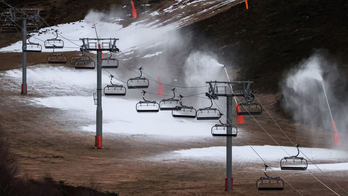This photograph shows a general view of snow cannons operating due to lack of snow at the Peyragudesski resort, southwestern France on January 5, 2023. 