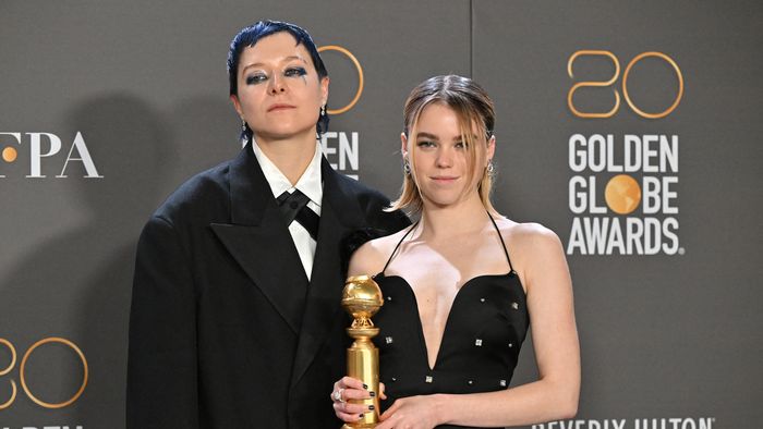 (From L) English actor Emma D'Arcy and Australian actress Milly Alcock pose with the award for Best Drama Series for "House of the Dragon" in the press room during the 80th annual Golden Globe Awards at The Beverly Hilton hotel in Beverly Hills, California, on January 10, 2023. 