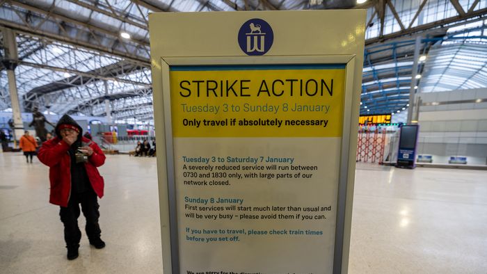 An information board about strike action was located at the entrance of Waterloo Station during railway strike action in the City of London, UK, on Tuesday, 3rd January, 2023. Rail workers in Britain will go on strike for most of this week, causing disruption to transportation. 