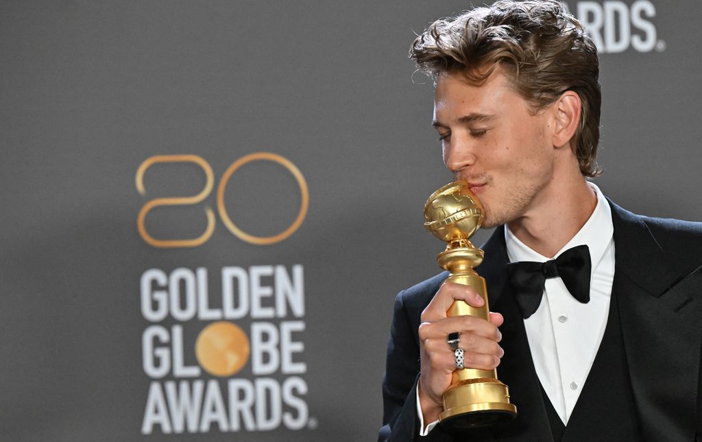 US actor Austin Butler poses with the award for Best Actor - Motion Picture - Drama for "Elvis" in the press room during the 80th annual Golden Globe Awards at The Beverly Hilton hotel in Beverly Hills, California, on January 10, 2023.