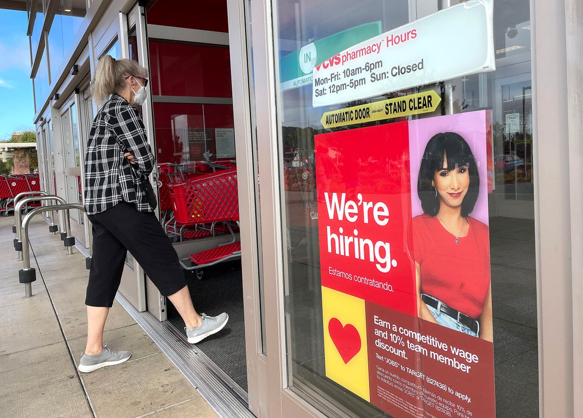 SAN RAFAEL, CALIFORNIA - AUGUST 05: A hiring sign is posted at a Target store on August 05, 2022 in San Rafael, California. According to data released by the Bureau of Labor Statistics, the U.S. economy added 528,000 jobs in July, far more than the 250,000 expected by analysts. The national unemployment rate dropped to 3.5%.