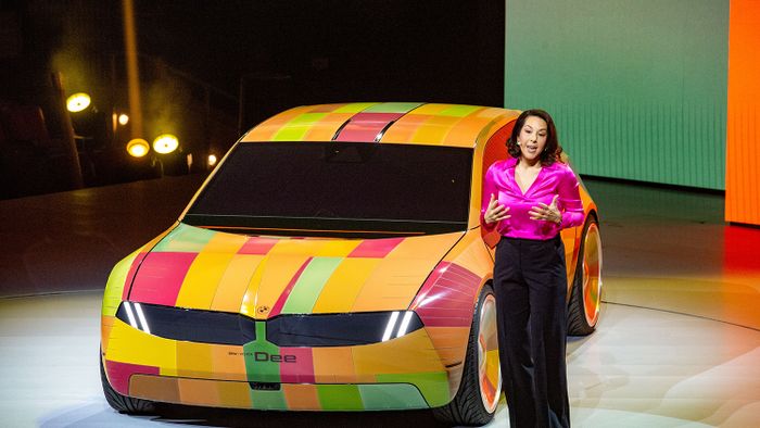 Technology Fair CES - BMW 04 January 2023, US, Las Vegas: BMW manager Stella Clarke is demonstrating technology at the CES technology trade show that allows a car to change color. To do this, the car body is covered with e-ink cells. Photo: Andrej Sokolow/dpa (Photo by Andrej Sokolow/picture alliance via Getty Images)