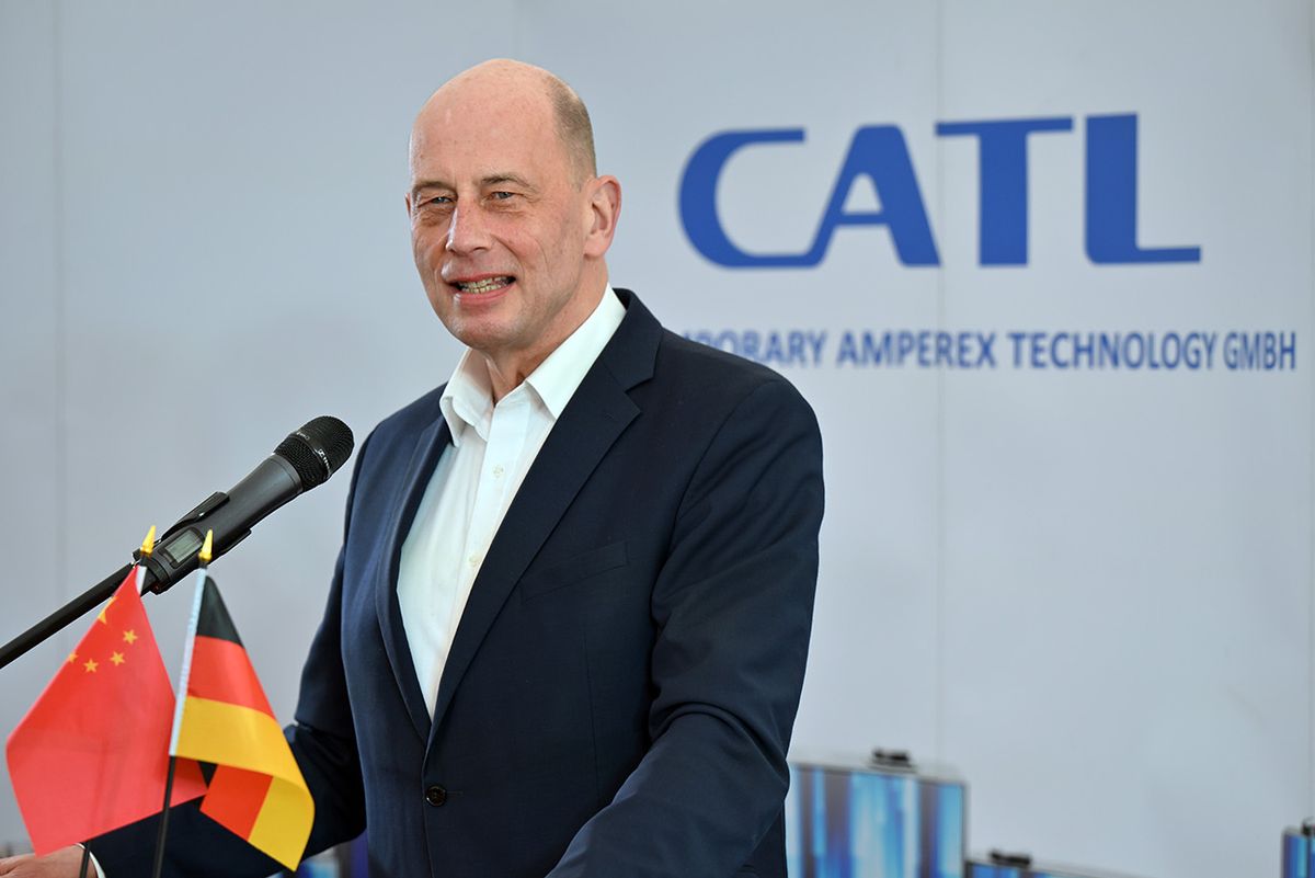 CATL battery cell factory 04 April 2022, Thuringia, Arnstadt: Wolfgang Tiefensee (SPD), Minister for Economy, Science and Digital Society of Thuringia, speaks at an event at the Contemporary Amperex Technology Thuringia GmbH (CATL) battery cell factory. Chinese battery manufacturer CATL will ramp up production at its new plant in the second half of the year. Interior work is currently underway at the new complex, which is over half a kilometer long and in which the Chinese company plans to invest around 1.8 billion euros. Photo: Martin Schutt/dpa (Photo by Martin Schutt/picture alliance via Getty Images)