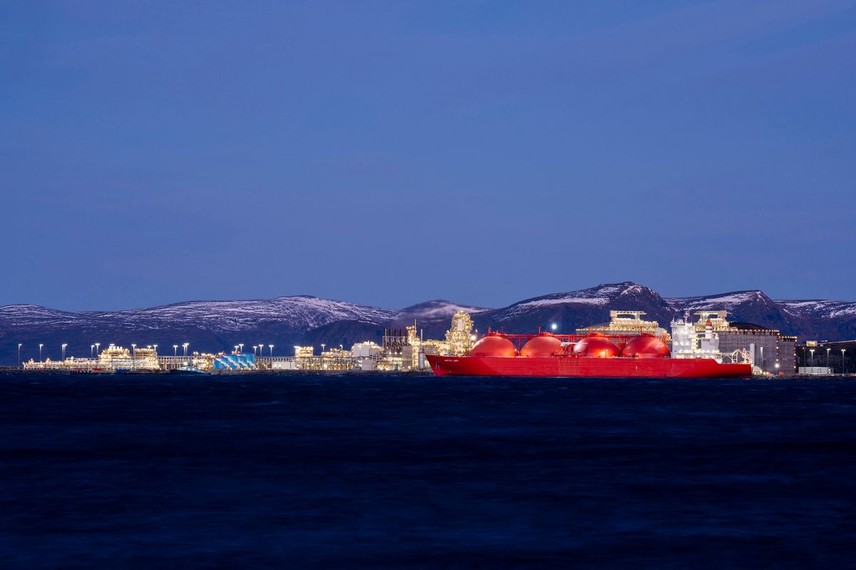 A LNG ship is pictured at the island Melkoya where Norwegian energy giant Equinor has built a facility for receiving and processing natural gas from the Snřhvit field in the Barents Sea on November 2, 2022 