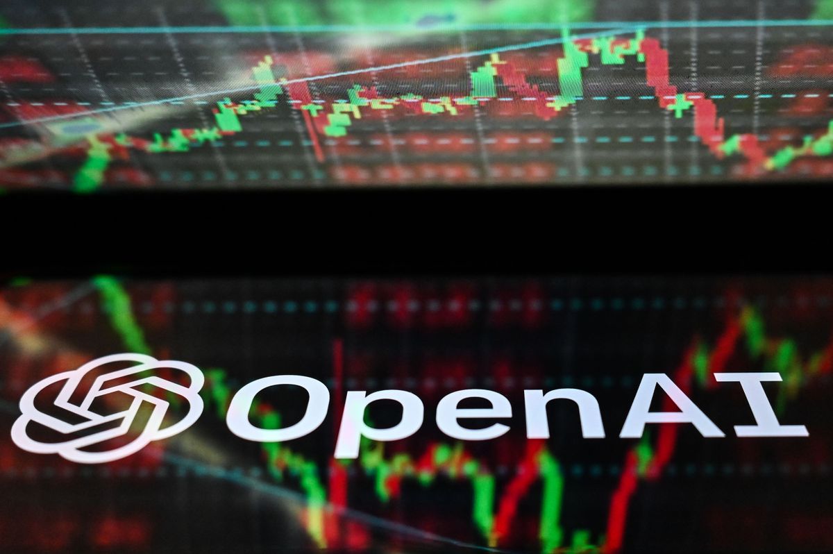POLAND - 2023/01/20: In this photo illustration, an OpenAI logo seen displayed on a smartphone with stock market exchange in the background.