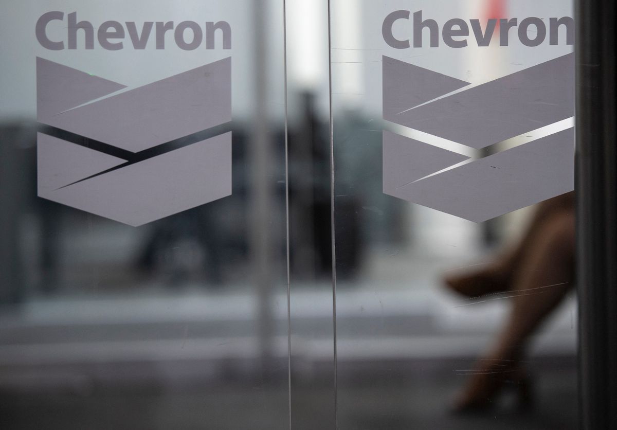 Chevron Global Technology Services Company logos are seen at an administrative office in Caracas on November 29, 2022. - The US government's authorisation of energy giant Chevron to operate in Venezuela will bring an upturn in the Caribbean country's stagnant oil production, but will have a "limited" impact on the international market, according to experts consulted by AFP. 