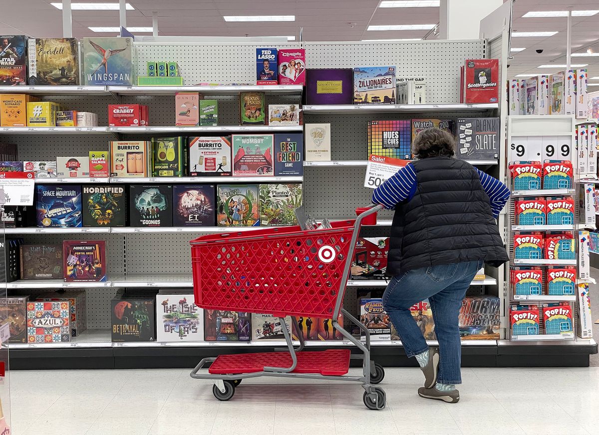 SAN FRANCISCO, CALIFORNIA - DECEMBER 15: A Target customer looks at a display of board games while shopping at Target store on December 15, 2022 in San Francisco, California. According to a report by the U.S. Commerce Department, retail sales fell 0.6% in November as consumers pulled back on spending due to rising prices brought on by inflation. 