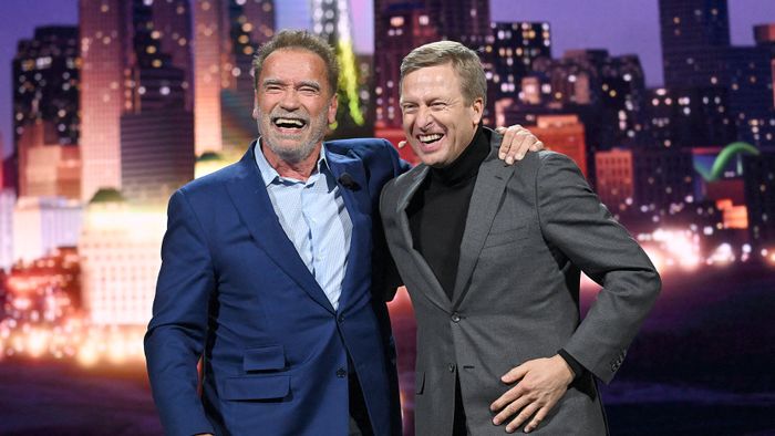 Consumer Electronics Show (CES) 2023 US-Austrian actor and Former Governor of California Arnold Schwarzenegger (L) and Oliver Zipse, Chairman of the Board of Management of BMW, stand on stage during the Consumer Electronics Show (CES) on January 4, 2023 in Las Vegas, Nevada. (Photo by Patrick T. Fallon / AFP)