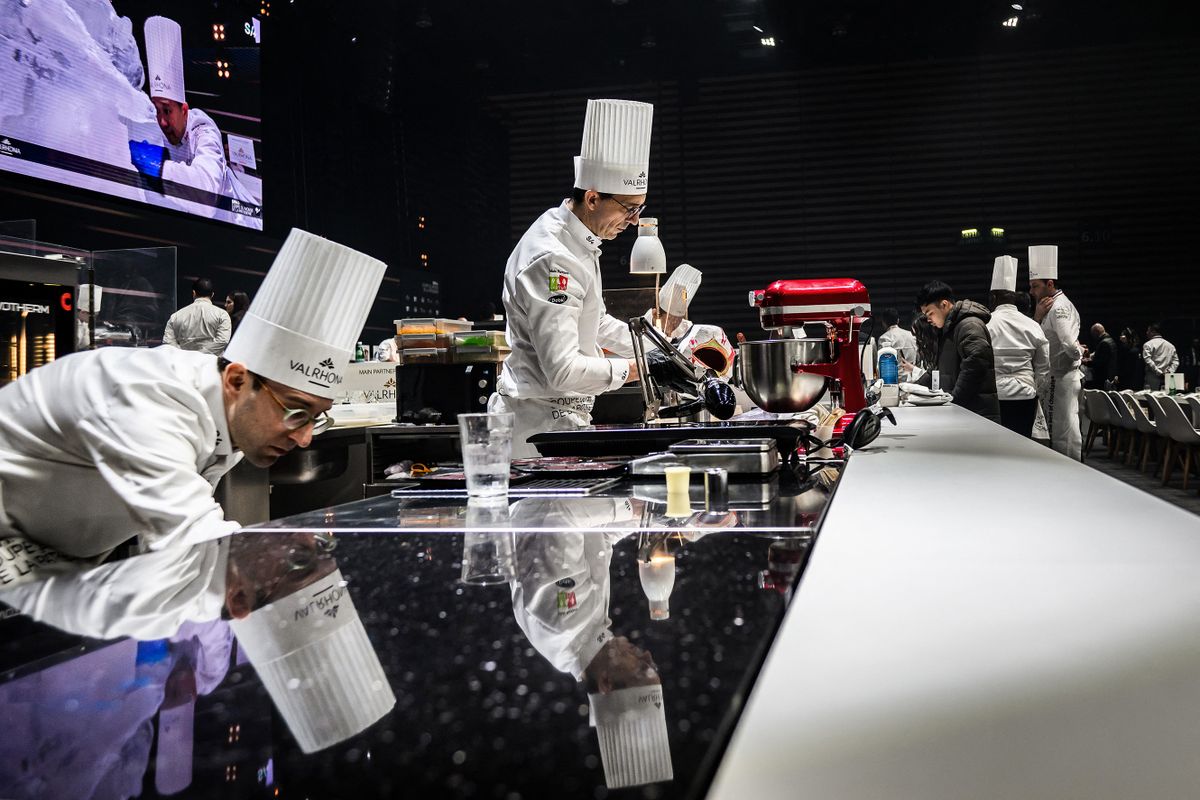 Team Canada’s Patrick Bouilly (R) and Jacob Pelletier(L) prepare a creation as they compete in the 2023 Bocuse d’Or pastry competition at the SIRHA (Salon International de la Restauration, de l’Hôtellerie et de l’Alimentation) in the Chassieu Eurexpo hall near Lyon, southeastern France, on January 21, 2023.