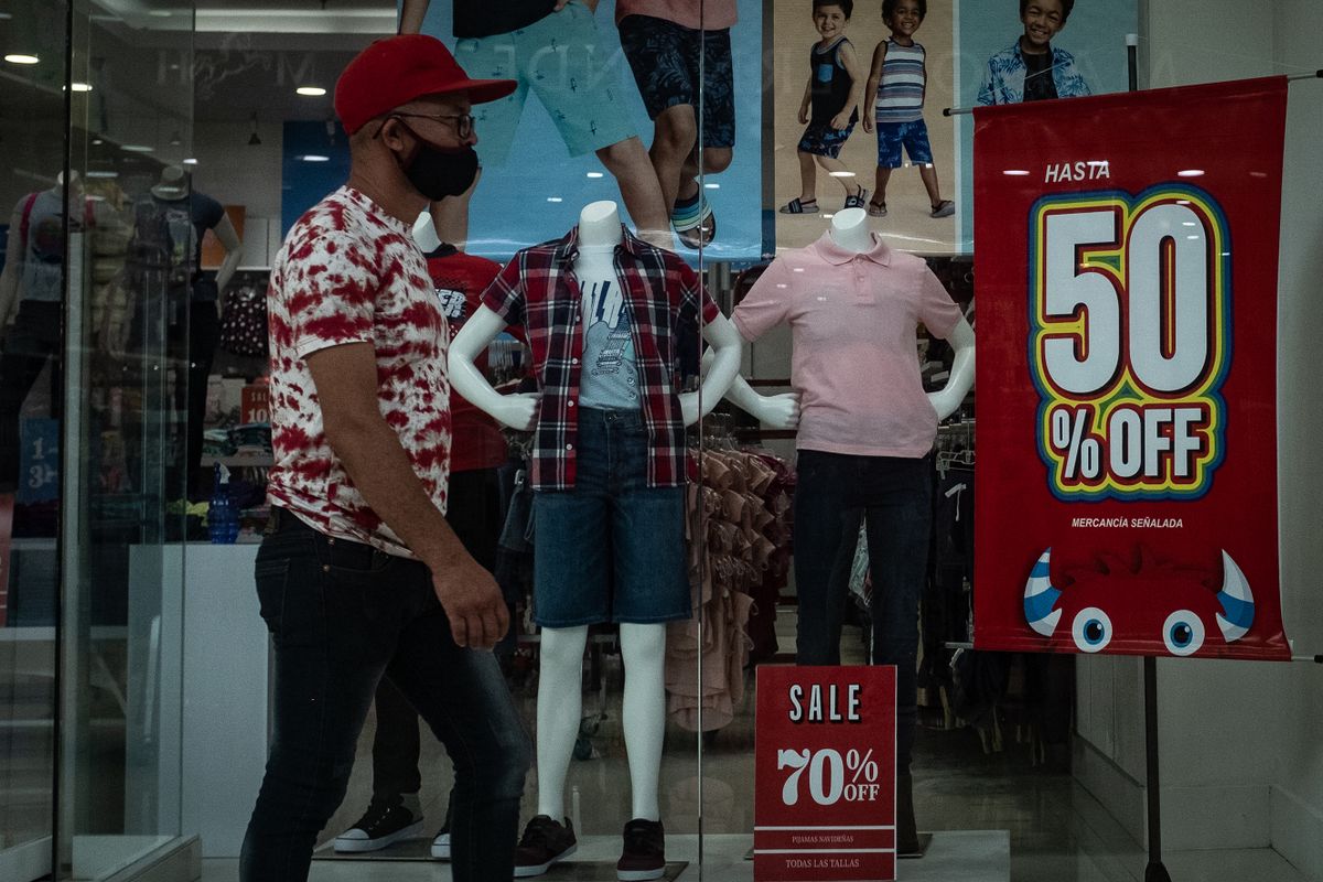Sale signs outside a clothing store in Barquisimeto, Venezuela, on Monday Sept. 19, 2022. Venezuela's monthly consumer price index accelerated to 8.2% in August, from 7.5% in July, according to Central Bank data.