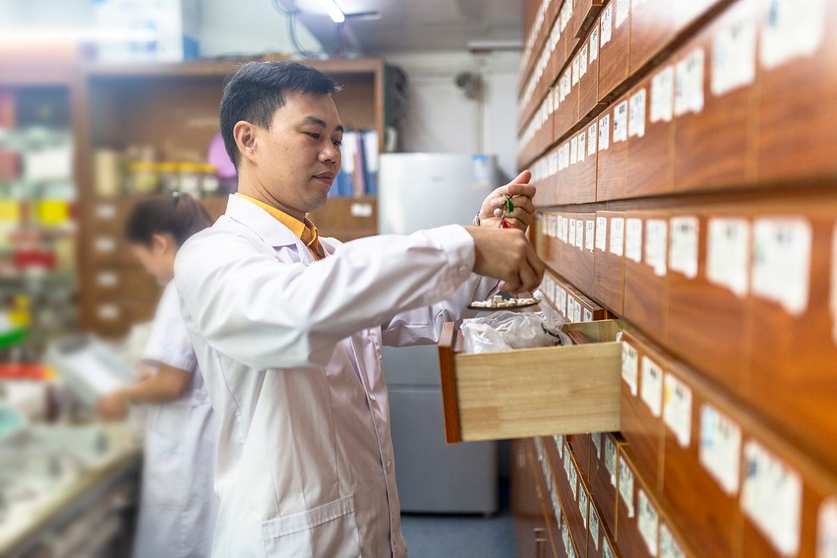 A Chinese male doctor weighs traditional Chinese medicine
A Chinese male doctor weighs traditional Chinese medicine