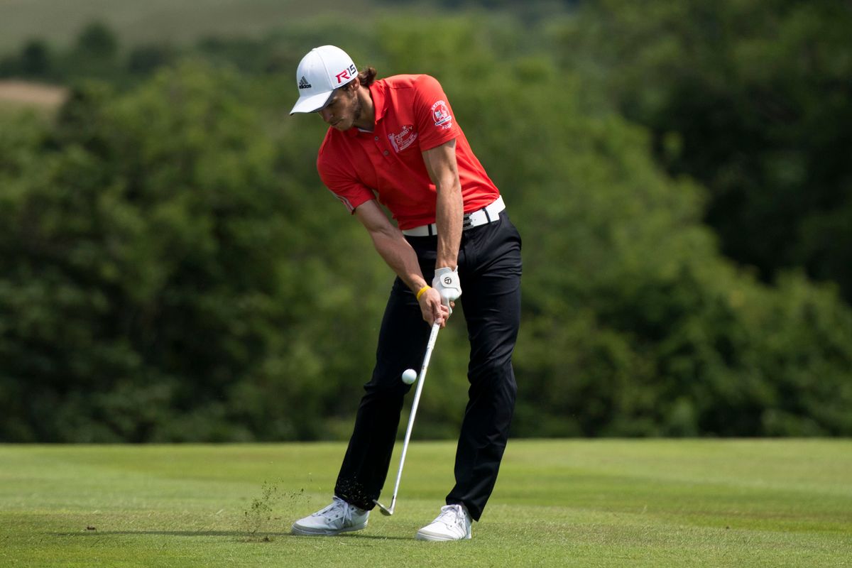 NEWPORT, WALES - JULY 04:  Gareth Bale takes a shot during the annual Celebrity Cup golf tournament at Celtic Manor Resort on July 4, 2015 in Newport, Wales. The Celebrity Cup sees celebrities from England, Wales, Ireland and Scotland competing against each other.  (Photo by Matthew Horwood/Getty Images)