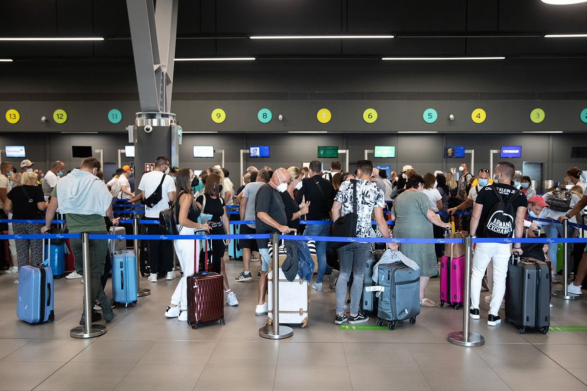 Greece Tourism Ahead Of Covid Control Passengers queue to check in inside Thessaloniki Makedonia Airport (SKG), operated by Fraport Greece, in Thessaloniki, Greece, on Thursday, Sept. 2, 2021. Greeces health minister announced plans in August to impose new measures, including testing requirements and restrictions, covering Sept. 13 to March 31, to slow the spread of the Coronavirus and target unvaccinated people. Photographer: Konstantinos Tsakalidis/Bloomberg via Getty Imagess