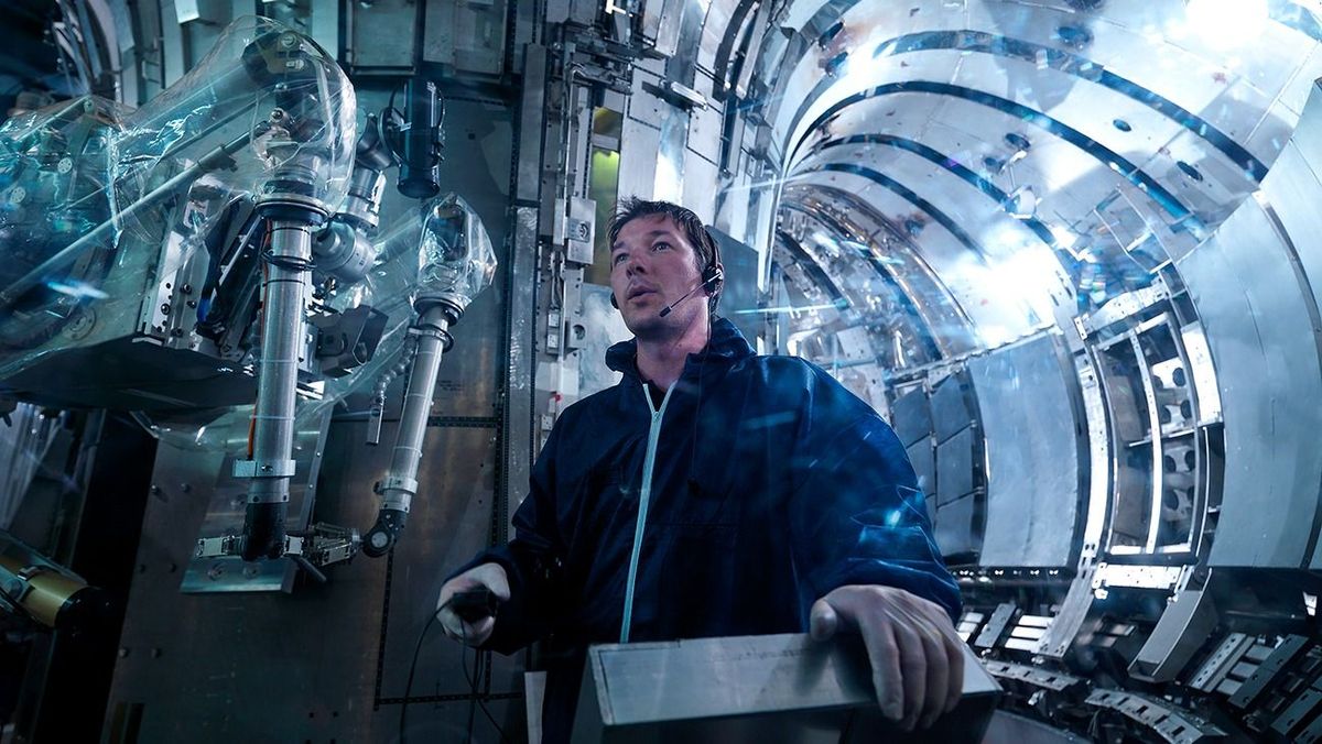 Scientist Working In A Fusion Reactor