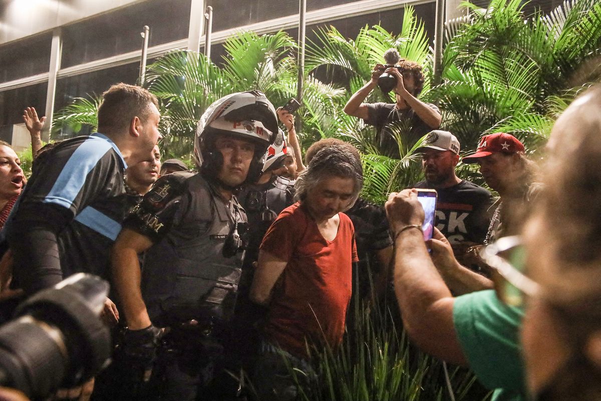 Man with revolver taken into custody during pro-government protest in Sao Paulo