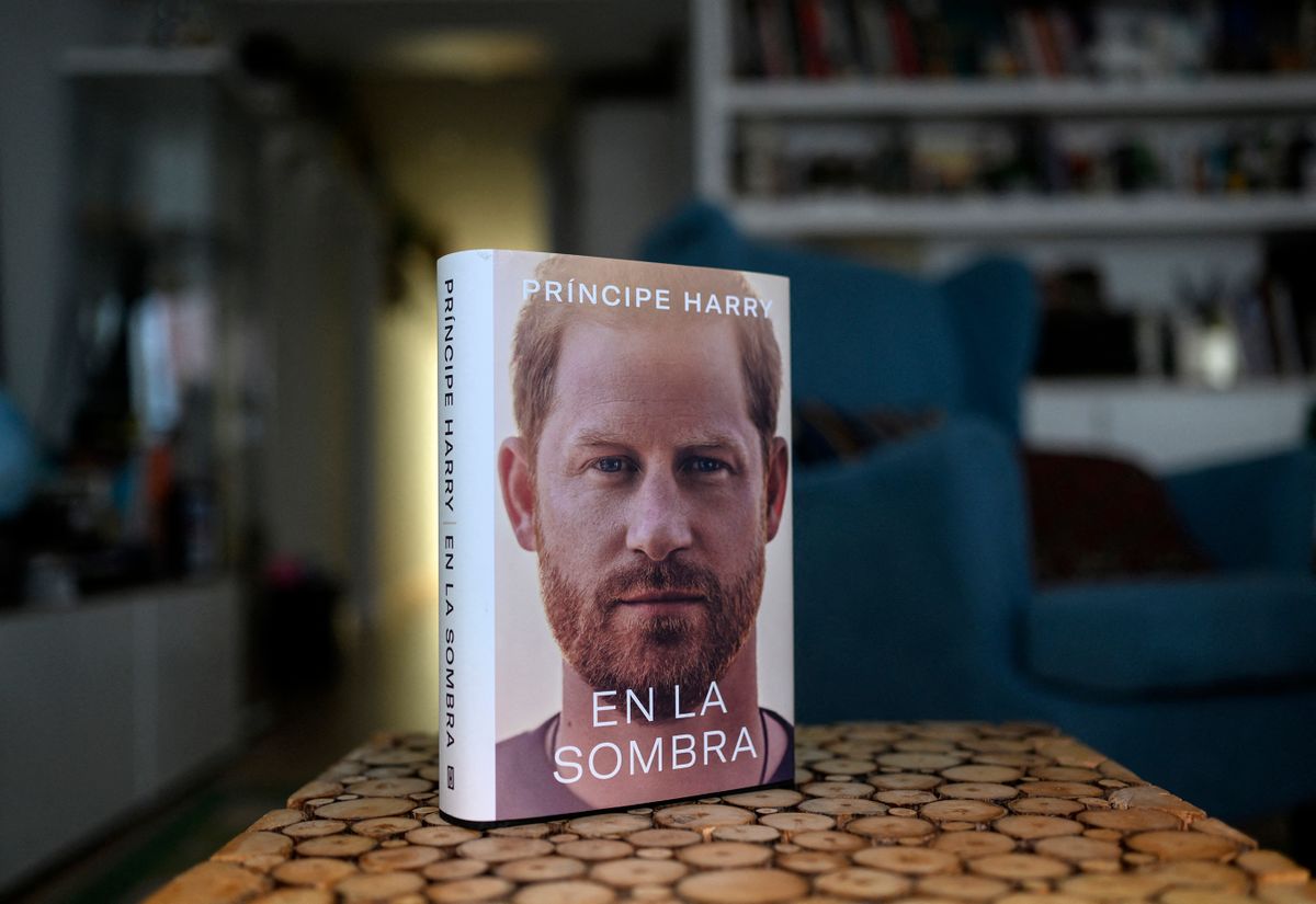 A copy of the "En la sombra" (In the shadow), Spanish version of the book "Spare" an autbiography by Britain's Prince Harry, is pictured at a reader's home in Madrid on January 5, 2023, despite the publication date set at January 10 with stringent measures in place. 