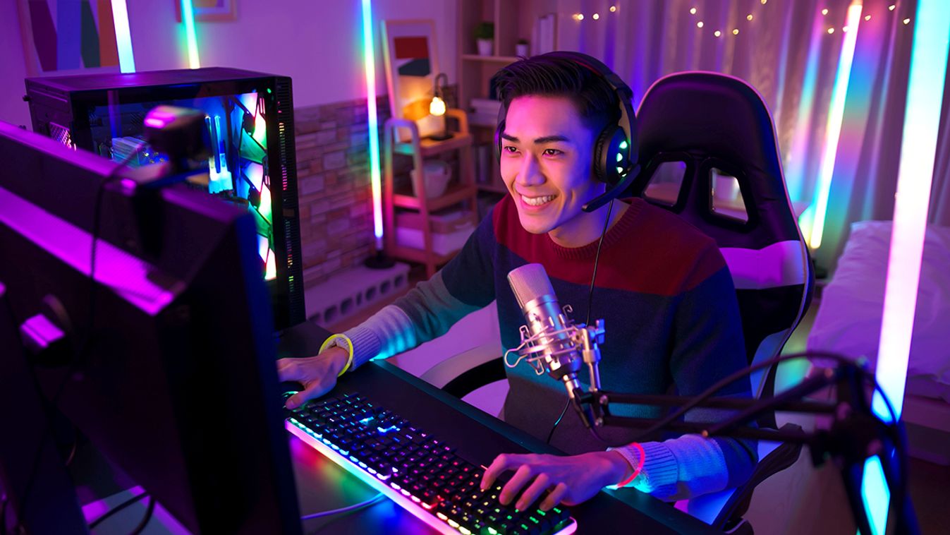 cybersport gamer have live stream Young Asian Pro Gamer have live stream with fans happily at home
