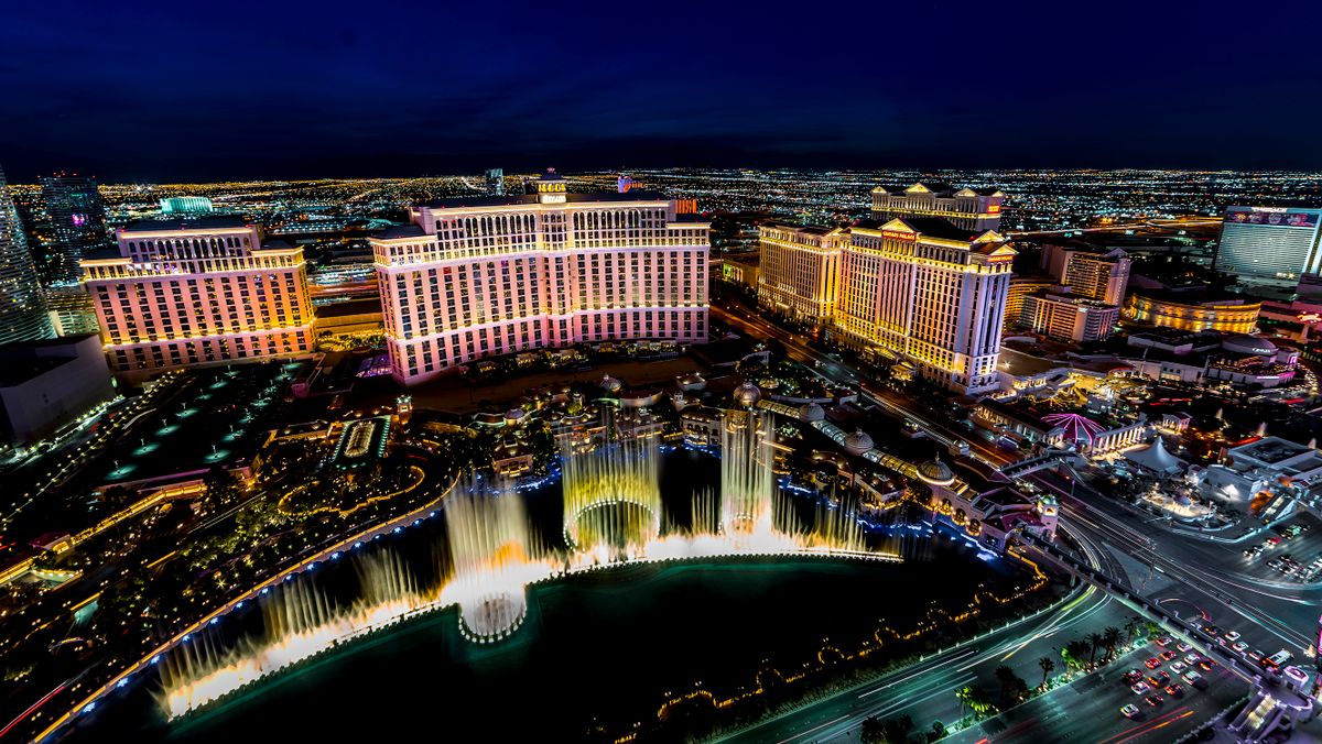 Panoramic View of Las Vegas Nevada at night with neon from Paris Eifel Tower view spot. 