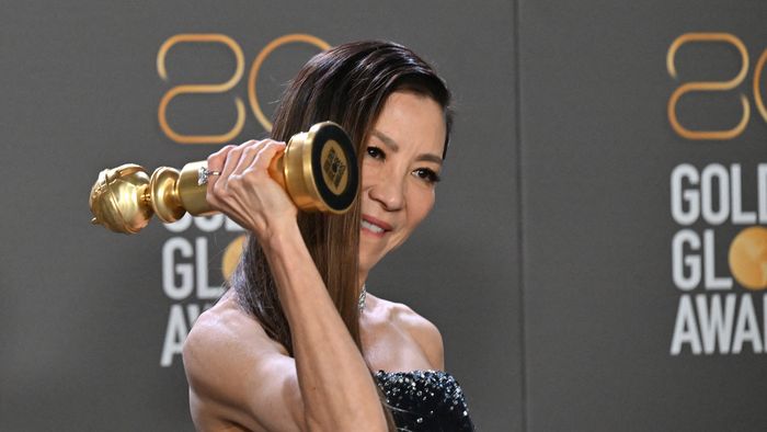 Malaysian actress Michelle Yeoh poses with the award for Best Actress - Motion Picture - Musical/Comedy for "Everything Everywhere All at Once" in the press room during the 80th annual Golden Globe Awards at The Beverly Hilton hotel in Beverly Hills, California, on January 10, 2023. (Photo by Frederic J. Brown / AFP)