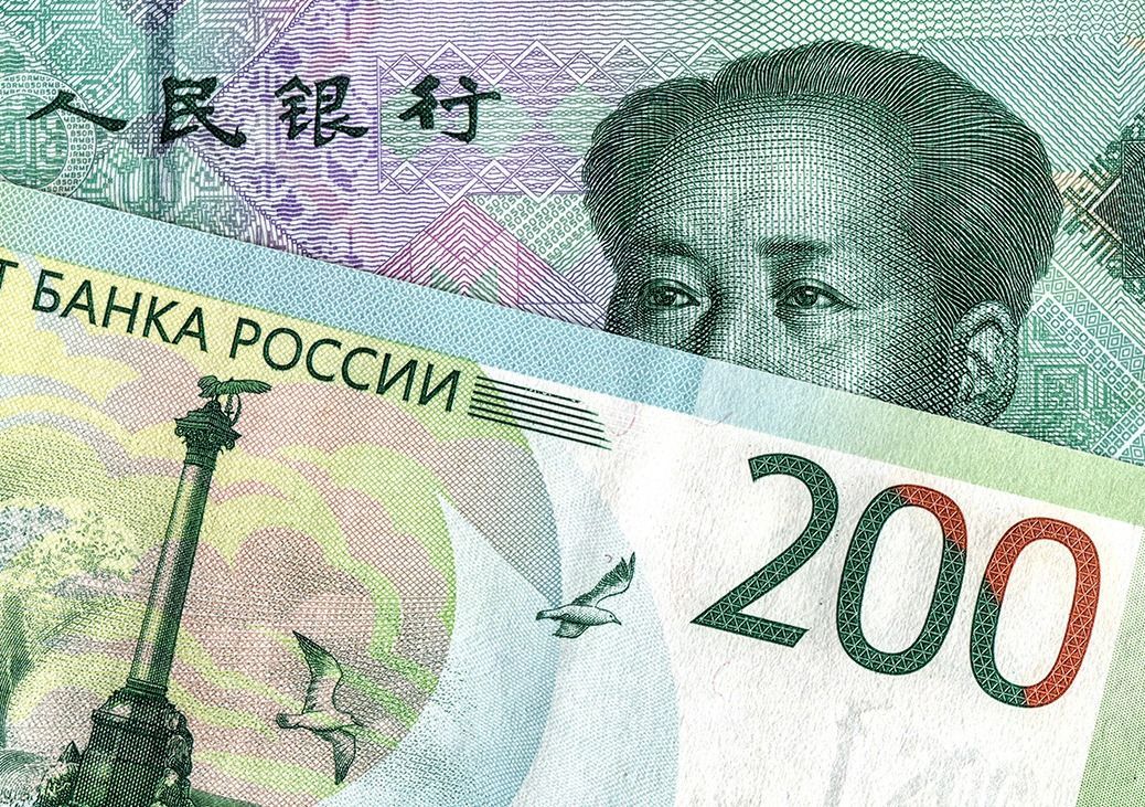 Chinese yuan banknote and russian rouble
Chinese yuan banknote and russian rouble. Concept trade and cooperation