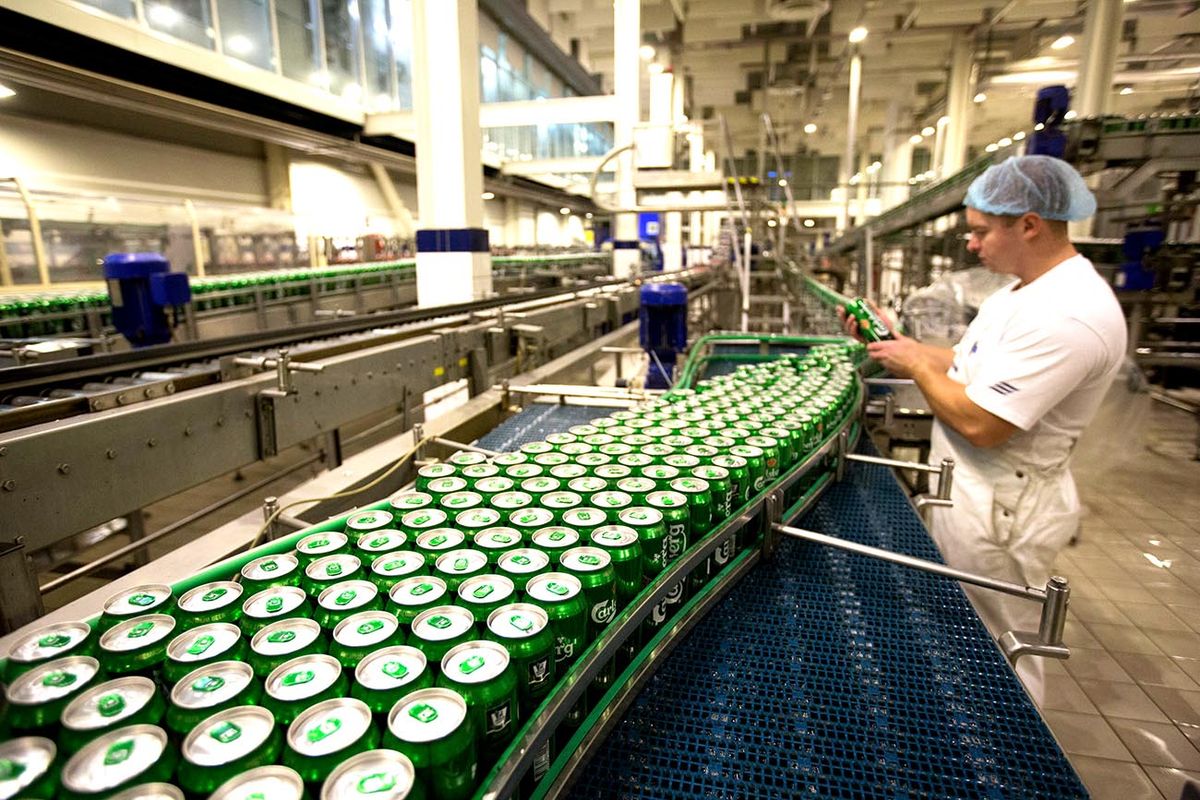 Russian Retail-Sales Growth Unexpectedly Gains Amid Ruble Crisis A worker inspects a can of Carlsberg beer as it moves a long the production line inside the OAO Baltika brewery, operated by Carlsberg A/S, in Saint Petersburg, Russia, on Wednesday, Dec. 17, 2014. Russia's retail-sales growth unexpectedly accelerated to the fastest in six months as people snapped up consumer goods out of concern prices will rise further amid the country's worst currency crisis since 1998. Photographer: Andrey Rudakov/Blooomberg