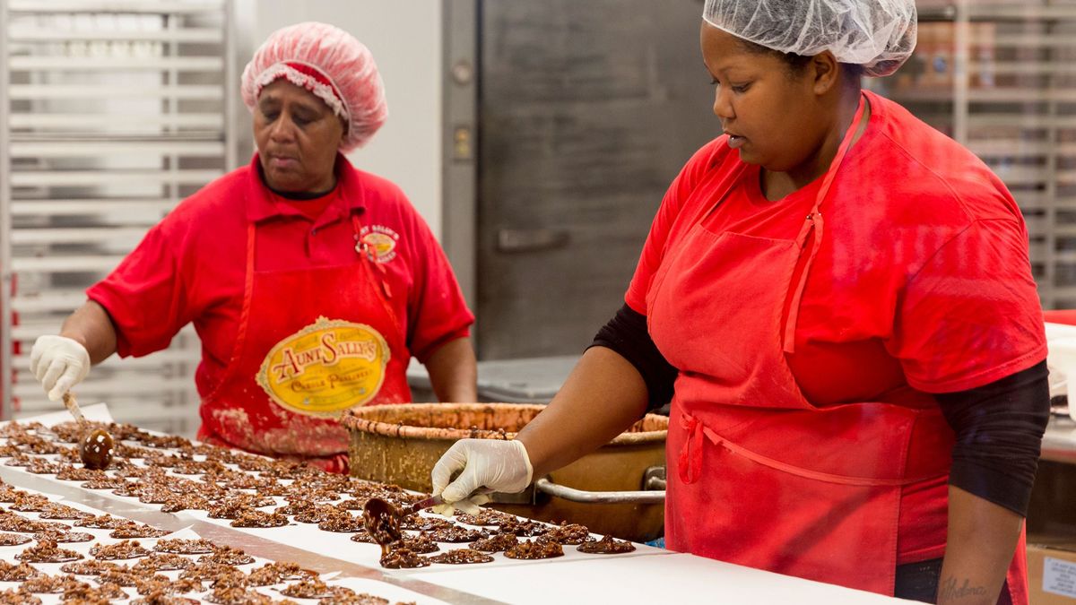 UNITED STATES - NOVEMBER 14: Women working at Aunt Sally's Creole Pralines factory in St Charles Avenue in New Orleans, Louisiana, USA (Photo by Tim Graham/Getty Images)