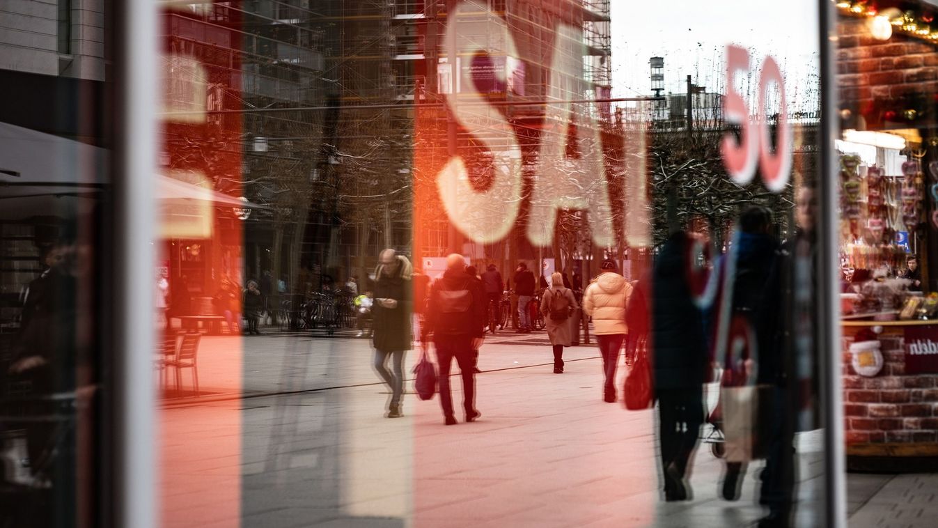 A sales advertisement in the window of a retail store in Frankfurt, Germany, on Friday, Dec. 30, 2022. European stocks were on track to cap their worst annual performance since 2018, triggered by a slowing economy over the war in Ukraine and aggressive central bank tightening. 