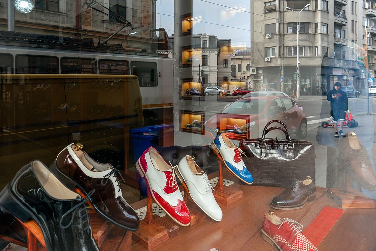 Romanian Economy Ahead of Central Bank Rates Decision Shoes displayed in the window of a fashion store in Bucharest, Romania, on Thursday, Jan. 5, 2023. Romania plans to raise as much as 8.5 billion ($9 billion) from the international debt markets this year to cover part of its total funding needs estimated at 160 billion lei ($34.5 billion) and reduce pressure on the domestic market. Photographer: Andrei Pungovschi/Bloomberg via Getty Images
