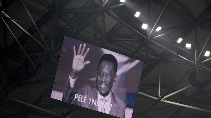 A photograph of Brazilian football legend Pele is displayed on a giant screen prior to the French L1 football match between Olympique de Marseille and Toulouse FC at the Velodrome stadium in Marseille on December 29, 2022. - Football legend Pele died on December 29, 2022 at the age of 82. 