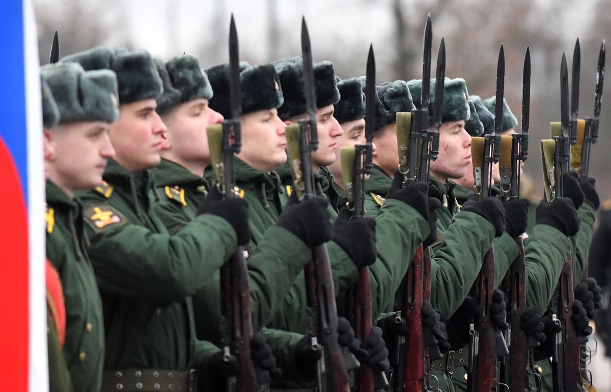 Russian servicemen attend a ceremony at Saint Petersburg's Victory Square (Ploschad Pobedy) to mark the 80th anniversary of the Nazi Siege of Leningrad breakthrough during World War II, on January 18, 2023. 