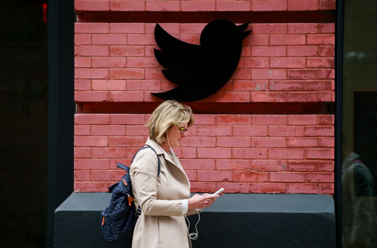 NEW YORK, NY - APRIL 26: People walk by the Twitter office on April 26, 2022 in New York City. Billionaire Elon Musk, CEO of Tesla and Space X, reached an agreement to purchase social media platform Twitter for $44 billion.  