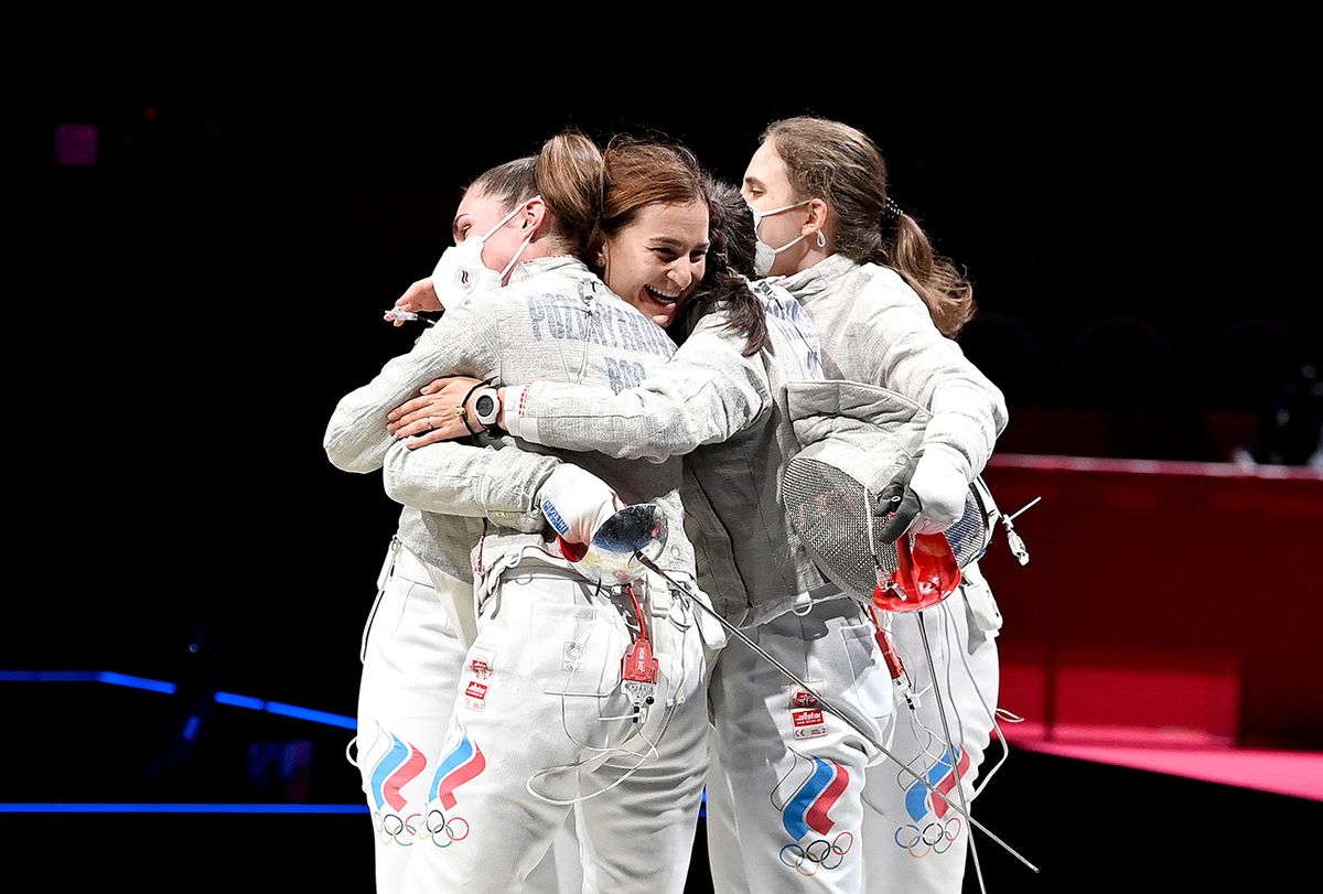 Fencing - Olympics: Day 8 CHIBA, JAPAN - JULY 31: Team Russia celebrates victory after winning the semi final match in the Women's Sabre Team event between Russia and Korea on day eight of the Tokyo 2020 Olympic Games at Makuhari Messe Hall on July 31, 2021 in Chiba, Japan. (Photo by Bradley Kanaris/Getty Images)