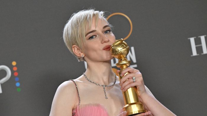 US actress Julia Garner poses with the award for Best Supporting Actress - Television Series for "Ozark" in the press room during the 80th annual Golden Globe Awards at The Beverly Hilton hotel in Beverly Hills, California, on January 10, 2023. 