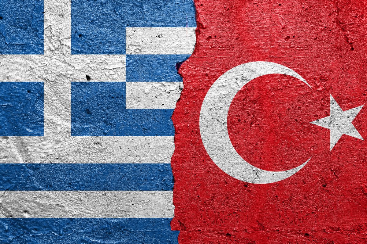 Greece,And,Turkey,-,Cracked,Concrete,Wall,Painted,With,A