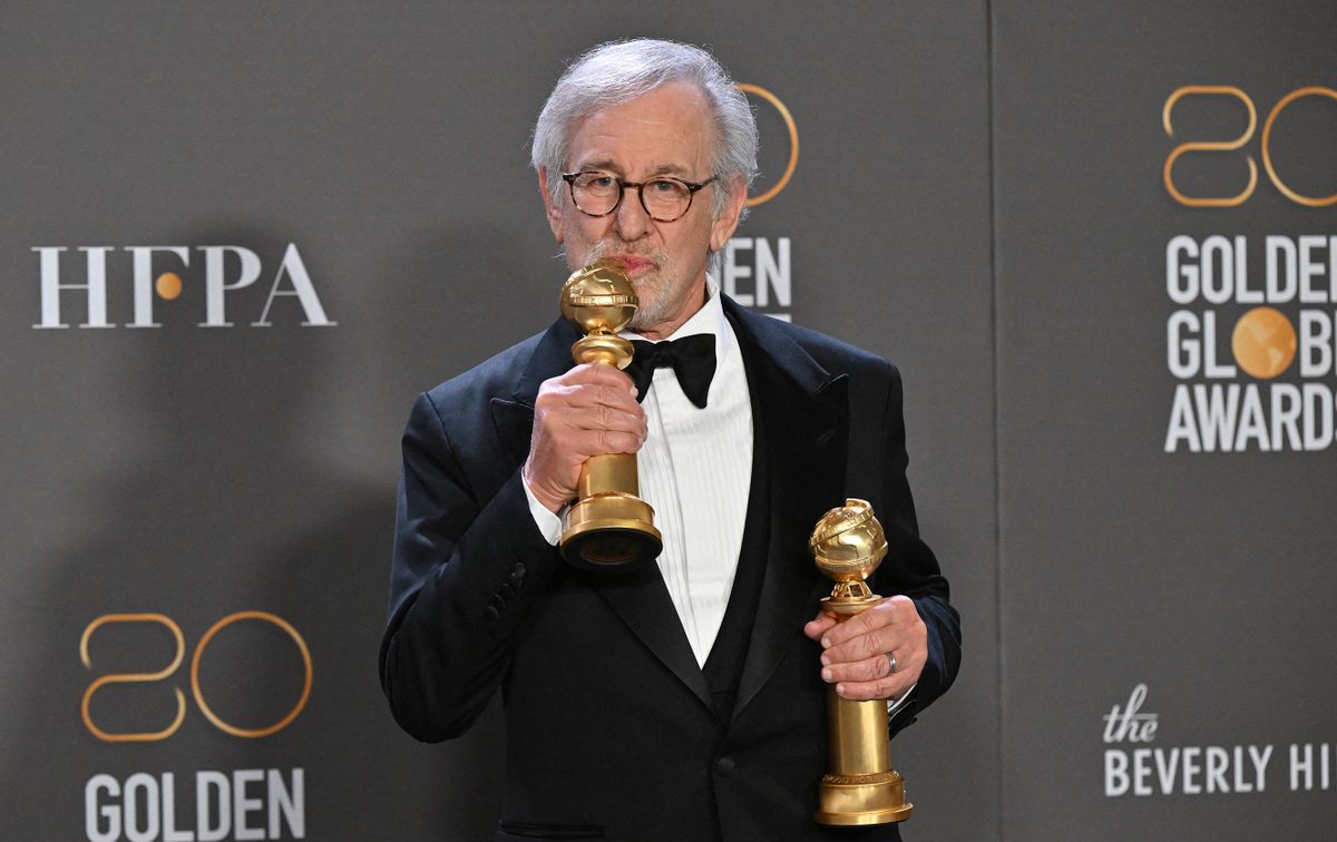 US director Steven Spielberg poses with the awards for Best Director - Motion Picture and Best Picture - Drama for "The Fabelmans" in the press room during the 80th annual Golden Globe Awards at The Beverly Hilton hotel in Beverly Hills, California, on January 10, 2023.